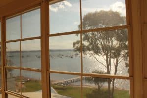 Lake View Through Wooden Framed Windows by HV Aluminium
