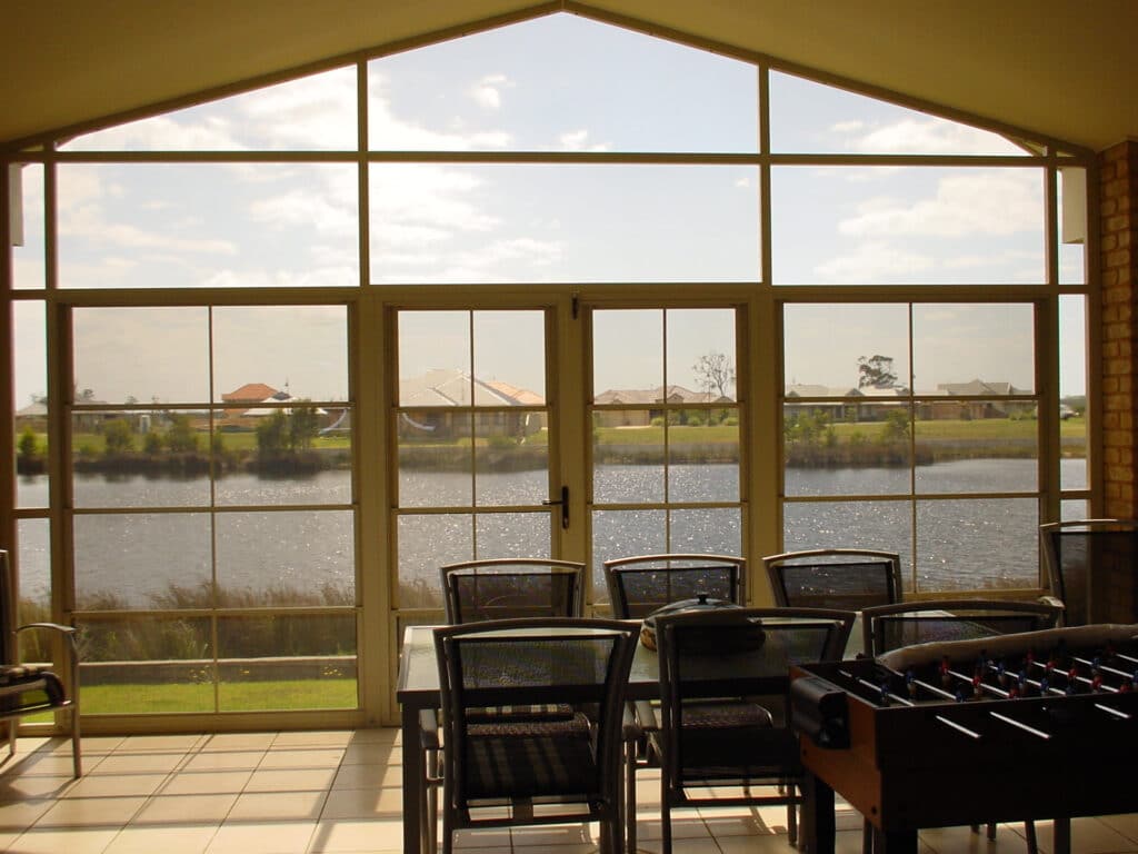 Sunroom overlooking the water.