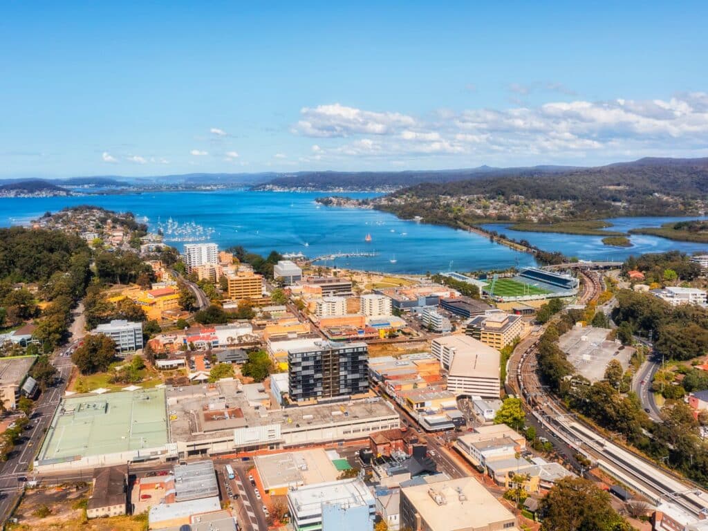 Aerial view of Central Coast area showing the beautiful coastline and nearby houses, hotels, and apartments.