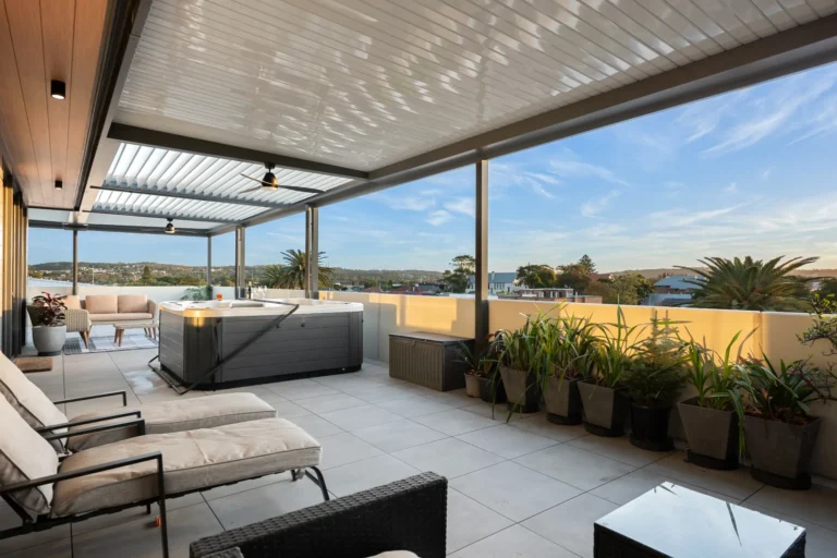 Balcony with closed louvre roof system installed on Hamitlon high rise building.