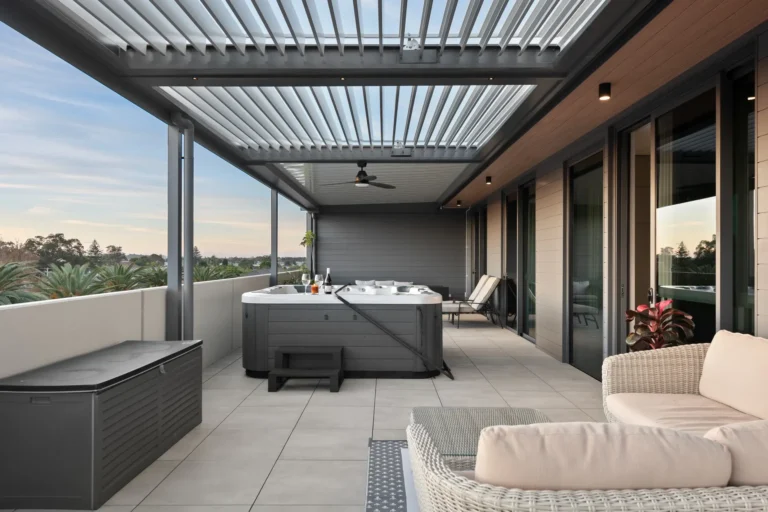 Outdoor ceiling fan installed on louvre roof.