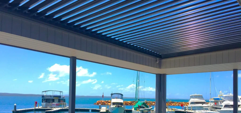 View of the harbour from under the aluminium louvre roof.