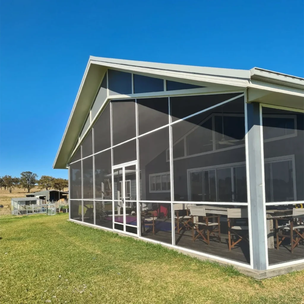 Screen room with gable roof design.